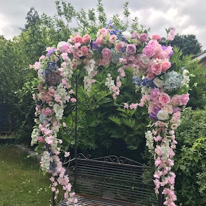 Guirnalda de flores de seda pastel: guirnalda floral con arco para bodas