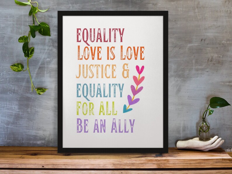 Puede incluir: Una impresi&oacute;n enmarcada con el texto "Equality Love is Love Justice & Equality For All Be An Ally" en colores arco&iacute;ris con un dise&ntilde;o de coraz&oacute;n.