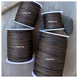 May include: Four spools of brown leather cord, each with a white label that reads "AntiqueCord".