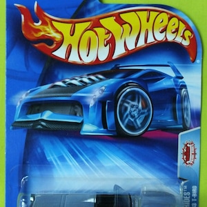Hot Wheels  Mattel  2003 PRIDE RIDES 1963 T-BIRD #211 Silver Blue/Red