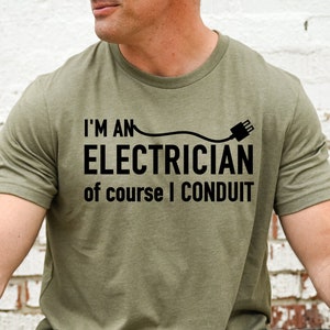 May include: A green t-shirt with a black graphic that says "I'm an electrician of course I conduit".