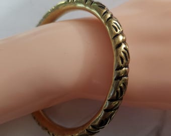 Pulsera esclava victoriana antigua de latón repousse