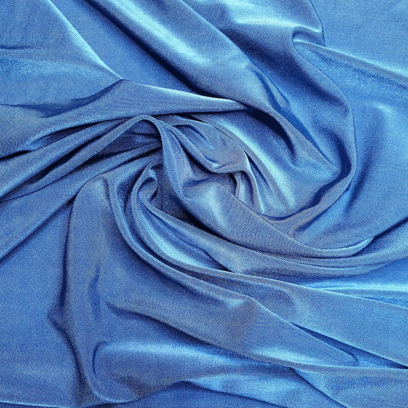 Electric blue green light weight stretch shimmer knit jersey dressmaking fabric price per metre 160cm 63 width