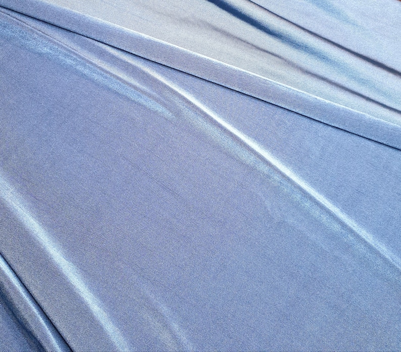 Electric blue green light weight stretch shimmer knit jersey dressmaking fabric price per metre 160cm 63 width