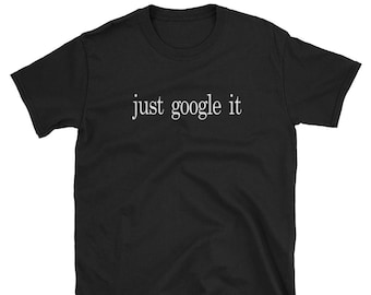 May include: Black t-shirt with the text "just google it" printed in white on the front.