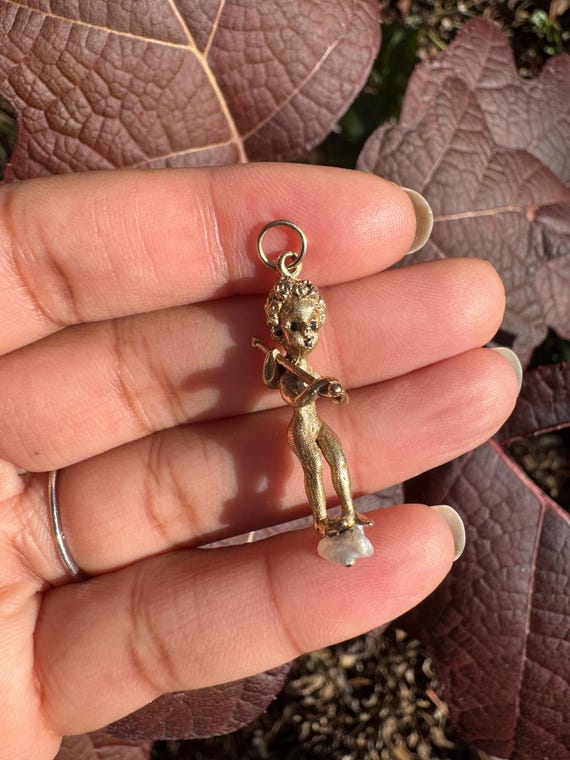 14K William Ruser Thursdays Child has far to go Charm, 5.2 grams, 1 1/2 inches. #PE1719