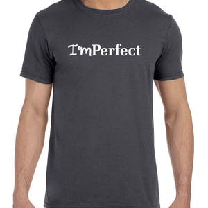 May include: A dark gray t-shirt with the text "I'mPerfect" printed in white on the front.