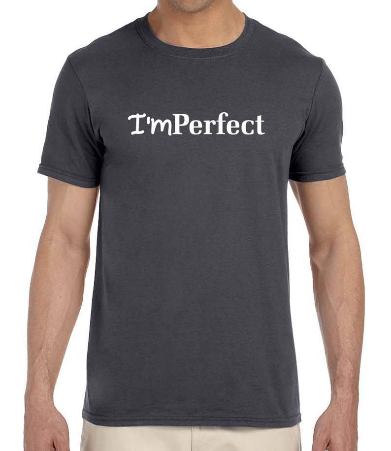 May include: A dark gray t-shirt with the text "I'mPerfect" printed in white on the front.