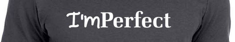 May include: A dark gray long-sleeved shirt with the text "I'mPerfect" printed in white on the front.