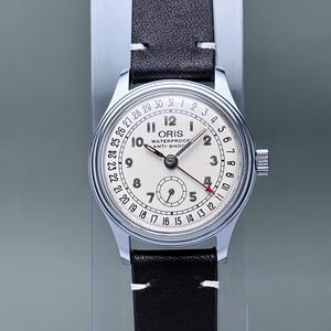 Vintage ORIS pointer date small seconds white dial 32mm
