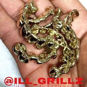 Handmade Custom Grillz In Dental Gold