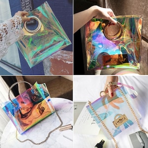 Four images of iridescent handbags. The bags are square or rectangular with gold-tone handles or chain straps. The bags have a clear, holographic appearance, reflecting a spectrum of colors. Some bags have a circular handle, while others have a chain strap.