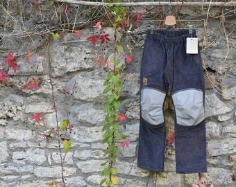 Buy now** robust corduroy trousers with reflective trimmings, 122