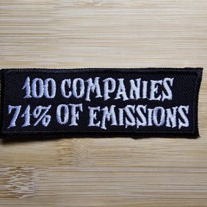May include: Black embroidered patch with white text that reads "100 Companies 71% of Emissions".