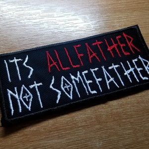 May include: Black embroidered patch with white and red stitching. The patch reads "It's Allfather Not Somefather".