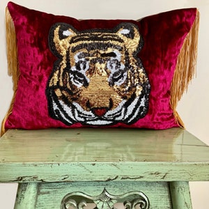 Pink velvet tiger sequin appliqué/ embroidered lumbar cushion with fringe.