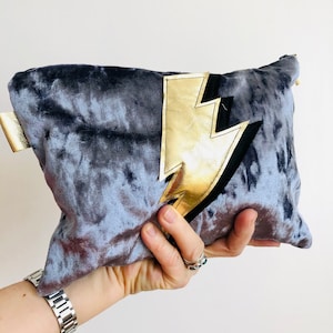 Silver grey Velvet makeup bag/ clutch with gold leather lightning bolt. Appliquéd with Ziggy Stardust lightning bolt. UK shipping.