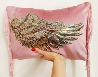Mink / pale pink velvet  lumbar cushion  with gold wing sequin appliqué.