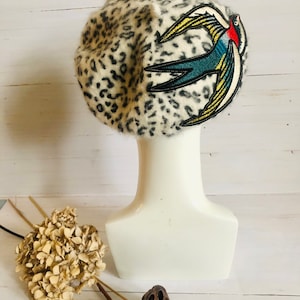 Animal print swallow embroidered beret. Tattoo inspired swallow, embroidered beret, pin-up style, tattoo artist gift, made in the UK.