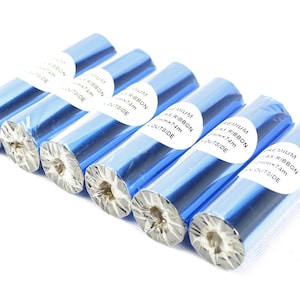 May include: Six rolls of blue wax ribbon for a thermal printer. Each roll is labelled "Premium Wax Ribbon 58mm x 74m Outside".