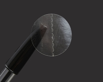 25mm Circular Polypropylene Clear Seals with Perforation - 1,000 labels on a roll. Security Labels