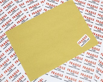 Fragile please handle with care labels / stickers. A4 sheets 65 per sheet. Perm Adhesive. Ideal for your packages, parcels & envelopes.