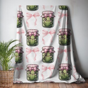 May include: A white background with a repeating pattern of cartoon pickle jars with pink bows. Each jar has a smiling pickle inside.