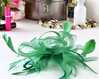 Green Looped Net and Feather Fascinator set on Ribbon Wrapped Clear Comb - Weddings, Race Meetings, Proms etc