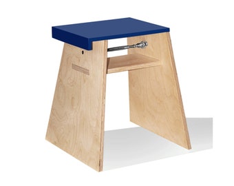 stool with a minimalist design in blue Corian and wood. Handmade in Italy