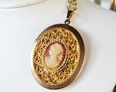 Vintage Gold Tone Cameo with Blush Pink Background Locket Pendant on Gold Tone Necklace