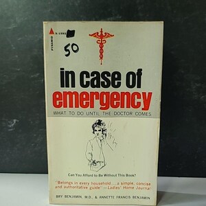 May include: Vintage paperback book titled "In Case of Emergency" with red and black text. The cover features a medical symbol and an illustration of a person. The book's subtitle is "What to Do Until the Doctor Comes."