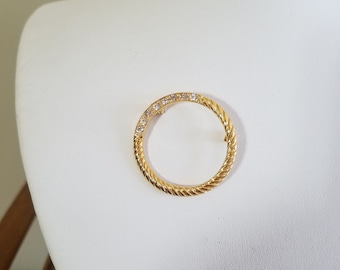 Vintage Clear Rhinestone Gold Tone Metal Circular Brooch