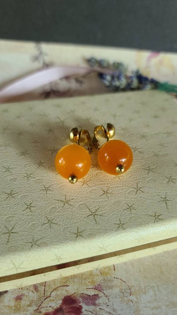 Celebrity Orange Dangling Clip-on Earrings - image 8