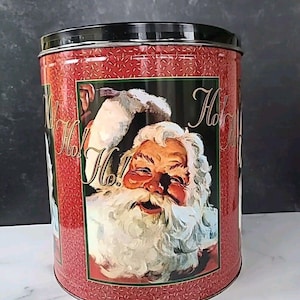 Lata vintage con tapa de Papá Noel, vacía, buen estado.