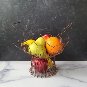 Faux Fruit In Wire Basket