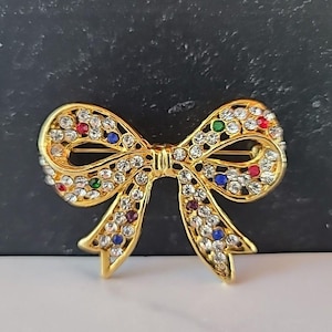 Bow Shaped Multicolored Rhinestone Gold Tone Brooch Vintage Costume Jewelry
