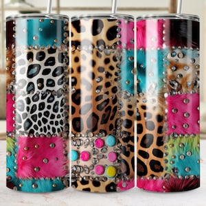 May include: Three stainless steel tumblers with a patchwork design. The designs include leopard print, faux fur in various colors, and studded accents. Each tumbler has a silver straw.