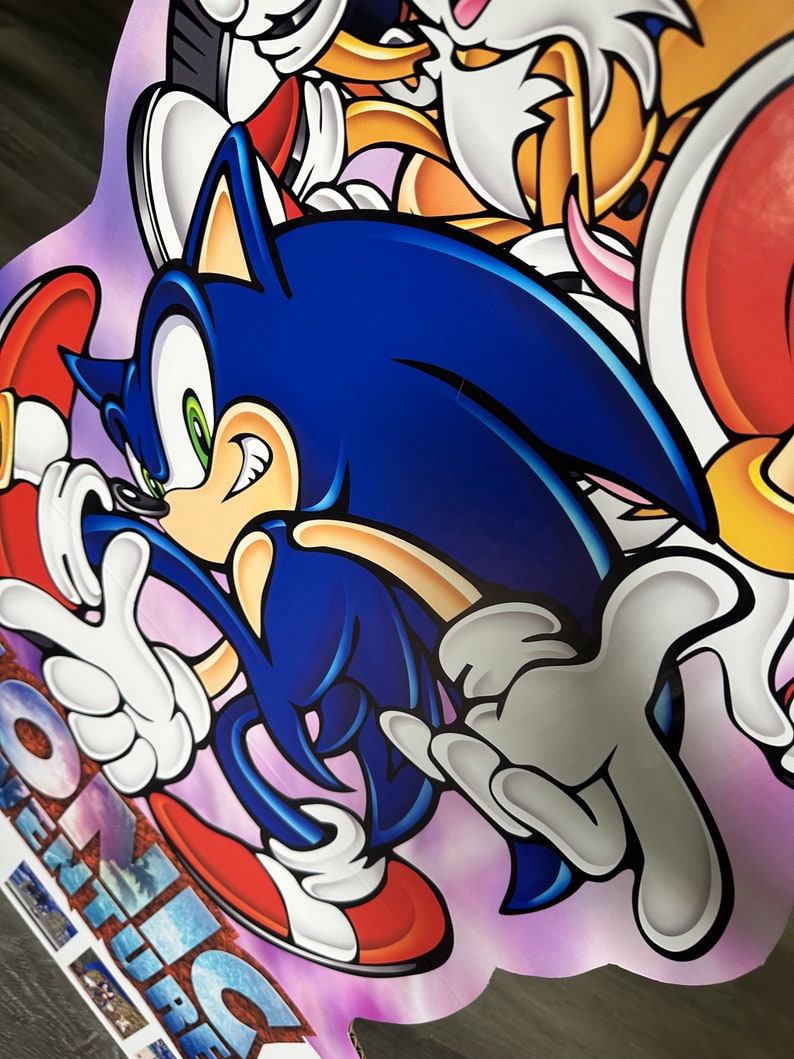 May include: A blue and white cartoon character with green eyes and a red shoe. The character is running and has a white glove on one hand. The background is purple and pink.