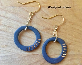 Boucles d'oreilles en noir et or