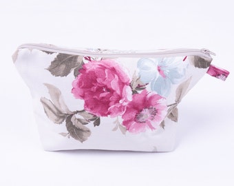 Fuchsia floral print make-up bag in water and stain resistant duck fabric