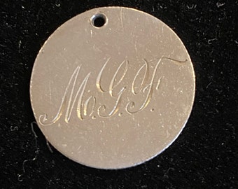 Love/Friendship token/charm from the 1800’s featuring the monogram “MGF”