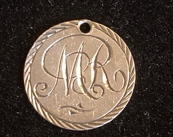Friendship/Love token/charm from the mid 1800’s featuring the initials “M.R.”