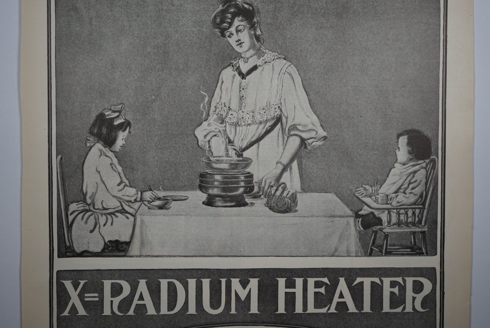 X=Radium Heater. Vintage Advertisement Featured in The Ladies Home