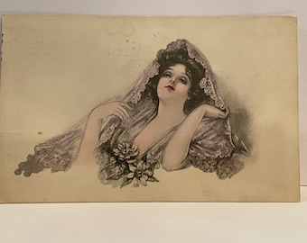 Antique postcard of a beautiful woman 1911