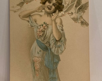Beautiful Antique postcard of a young woman with Doves signed by artist early 1900’s