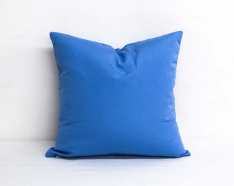 Sunbrella Canvas Capri Blue Indoor/outdoor Decorative throw pillow with Pillow Insert and Zipper Closure