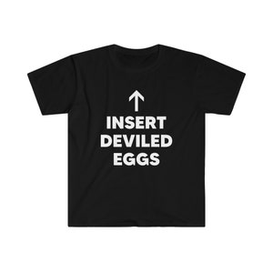 May include: Black t-shirt with white text that reads "Insert Deviled Eggs" with an arrow pointing upwards.
