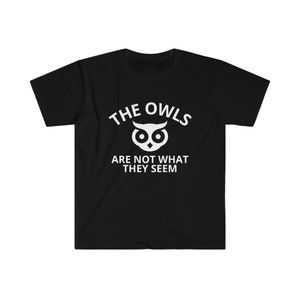 May include: Black t-shirt with a white owl graphic and the text "THE OWLS ARE NOT WHAT THEY SEEM".