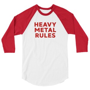 May include: A white and red baseball tee shirt with the text "Heavy Metal Rules" in red letters.