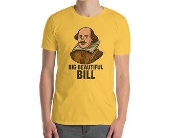 May include: Mustard yellow t-shirt featuring a cartoon illustration of William Shakespeare with the text "BIG BEAUTIFUL BILL" in black. The graphic depicts Shakespeare in a brown and tan outfit with a white collar.
